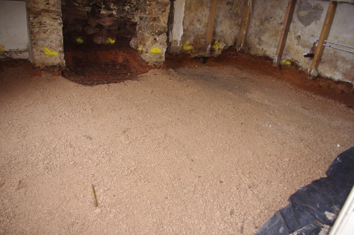 Fireplace showing floor in progress